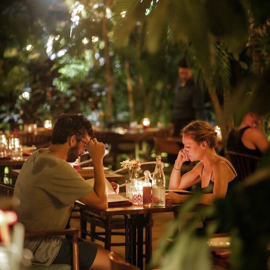 Candlelit garden dining at Uma Garden